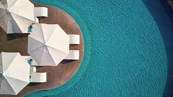 2 outdoor pools, pool umbrellas, pool loungers