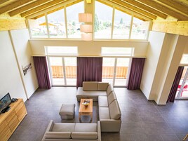 Premium Apartment, 4 Bedrooms, Balcony | Living area | Flat-screen TV