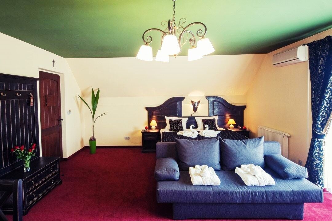 deluxe suite, balcony | select comfort beds, desk, iron/ironing board, free cots/infant beds