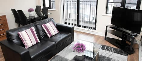 32-inch flat-screen TV with cable channels, TV