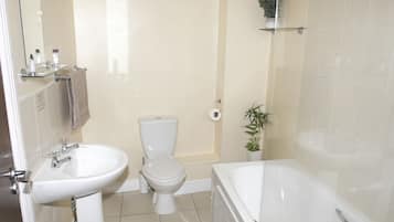 Separate bathtub and shower, free toiletries, hair dryer, towels