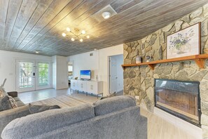 57-inch flat-screen TV with satellite channels, TV