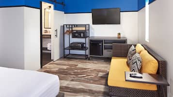 Room, 2 Double Beds, Partial Ocean View | Living area | 50-inch TV with cable channels, pay movies