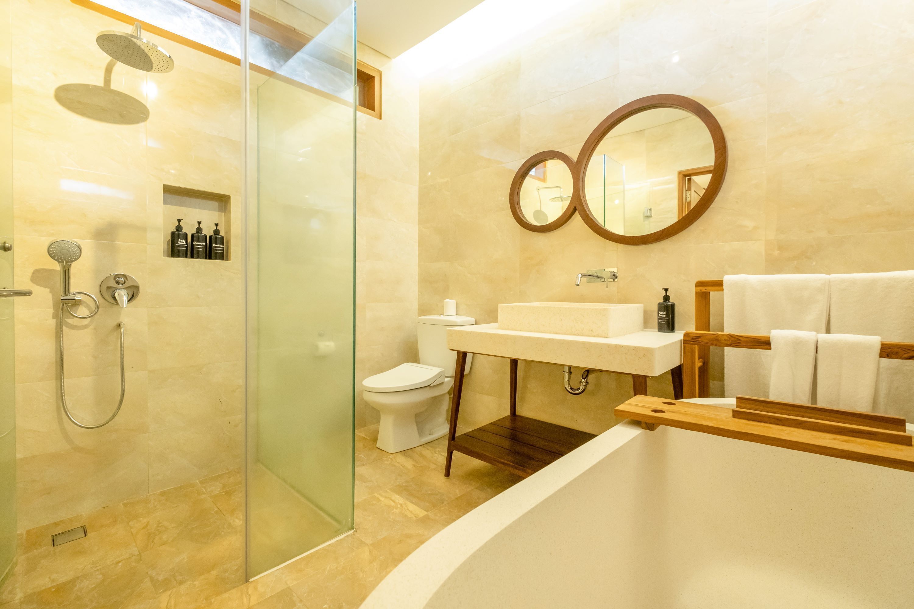 suite room | bathroom | separate bathtub and shower, rainfall showerhead, free toiletries