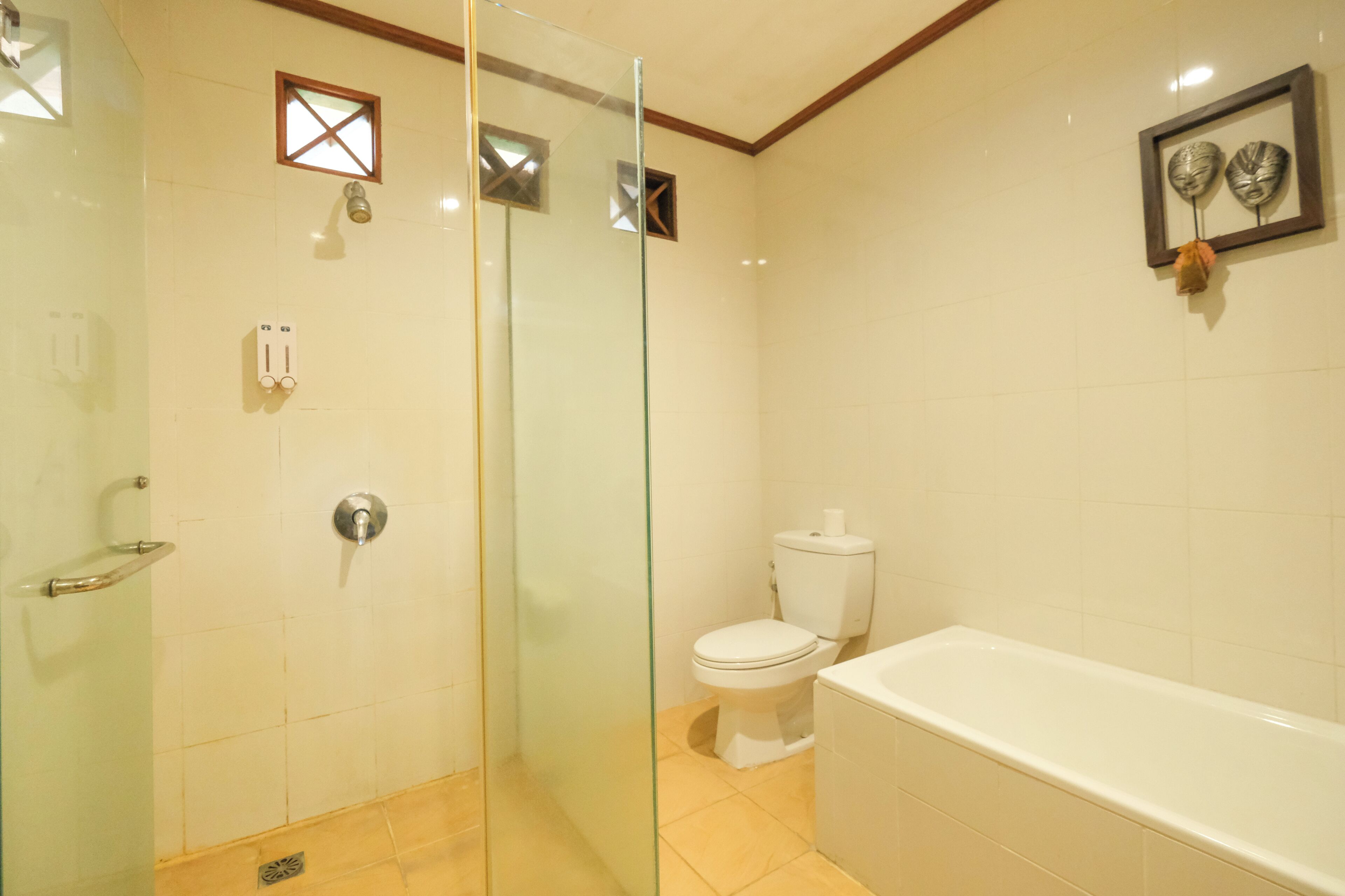 deluxe room, garden view | bathroom | separate bathtub and shower, rainfall showerhead, free toiletries