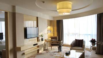 Deluxe Suite, 1 King Bed | Living area | LCD TV