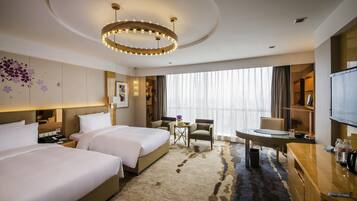 Premium bedding, free minibar items, in-room safe