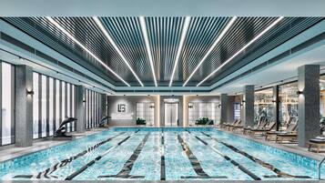 Indoor pool, open 7:00 AM to 10:00 PM, sun loungers