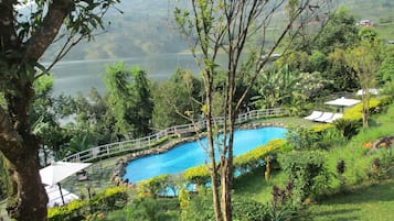Outdoor pool, pool umbrellas, pool loungers