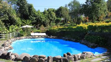 Outdoor pool, pool umbrellas, sun loungers