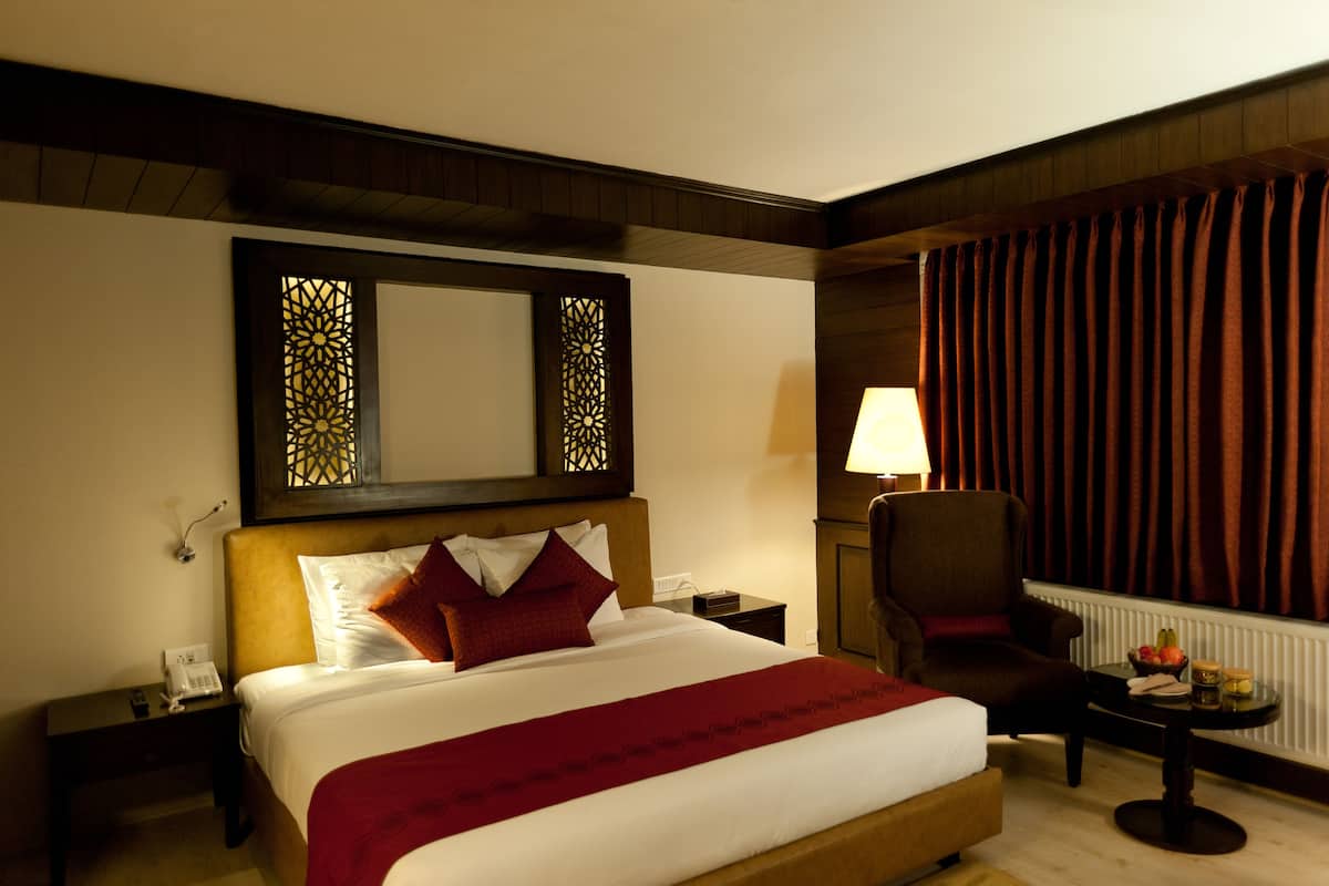 deluxe room | in-room safe, desk, blackout curtains, iron/ironing board