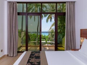 Chambre Deluxe double, vue sur la mer | Literie de qualité, lit avec matelas à plateau-coussin, minibar