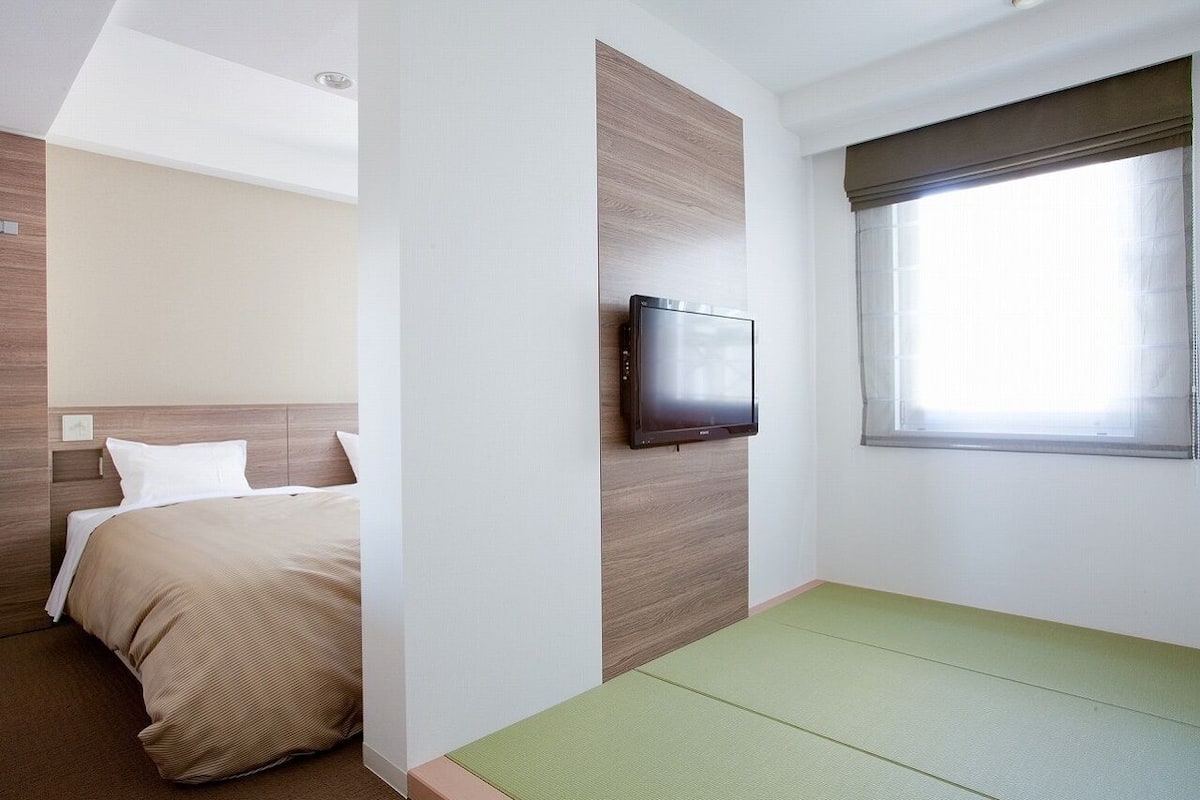 FamilieTwin kamer, niet-roken | Luxe beddengoed, Select Comfort-bedden, een bureau, gratis wifi