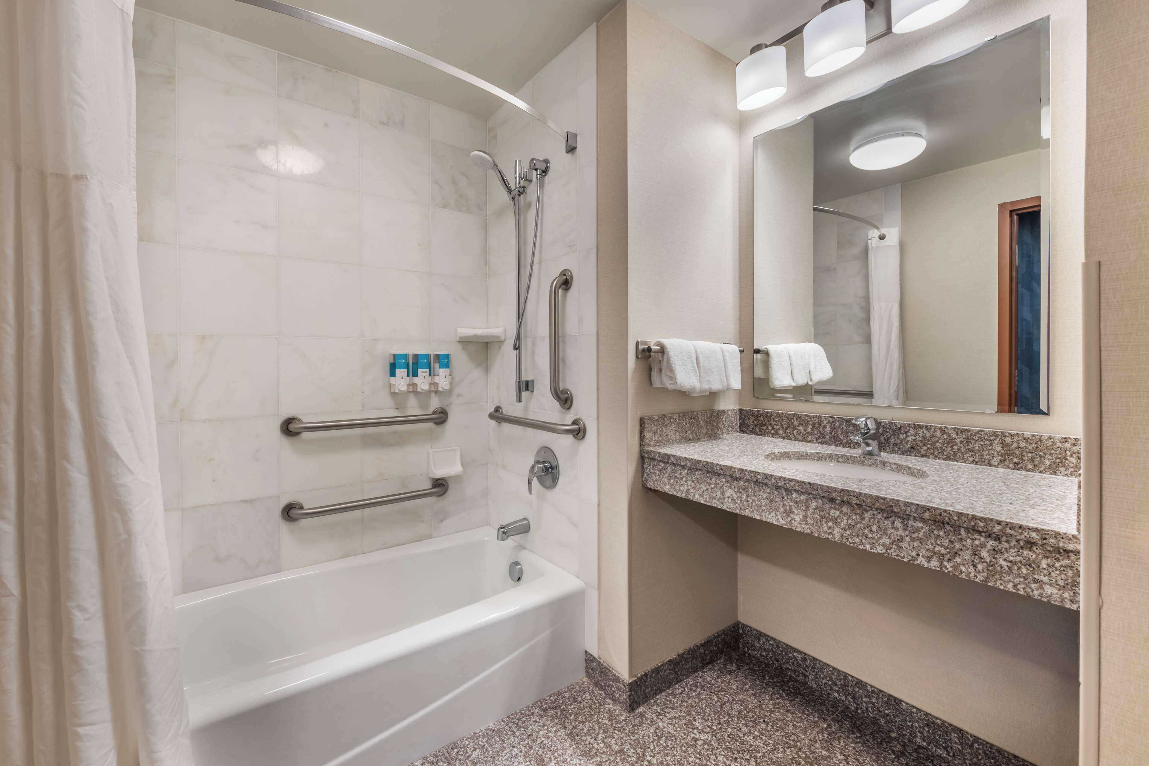 combined shower/bathtub, free toiletries, hair dryer, towels