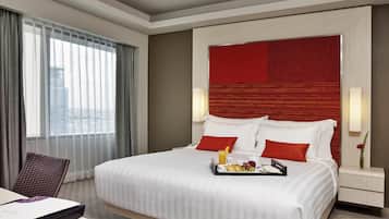 Suite empresarial, 1 cama matrimonial | 1 habitación, minibar, caja de seguridad en la habitación y escritorio