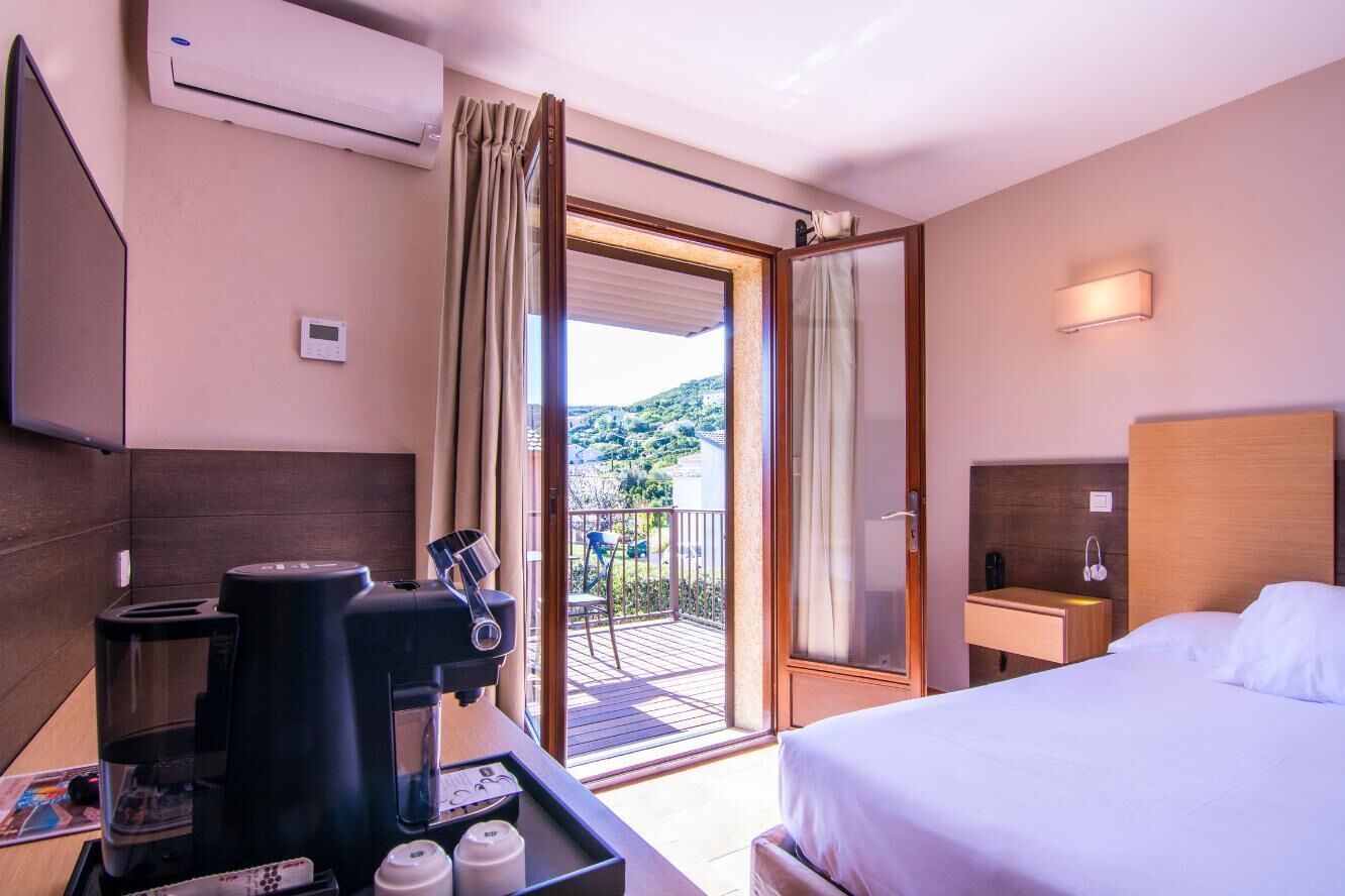 standard double room, terrace | minibar, in-room safe, desk, blackout curtains