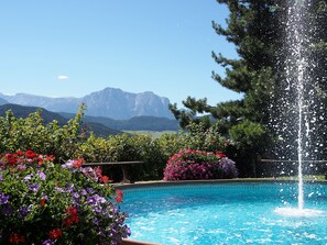 Indoor pool, seasonal outdoor pool, pool umbrellas, pool loungers