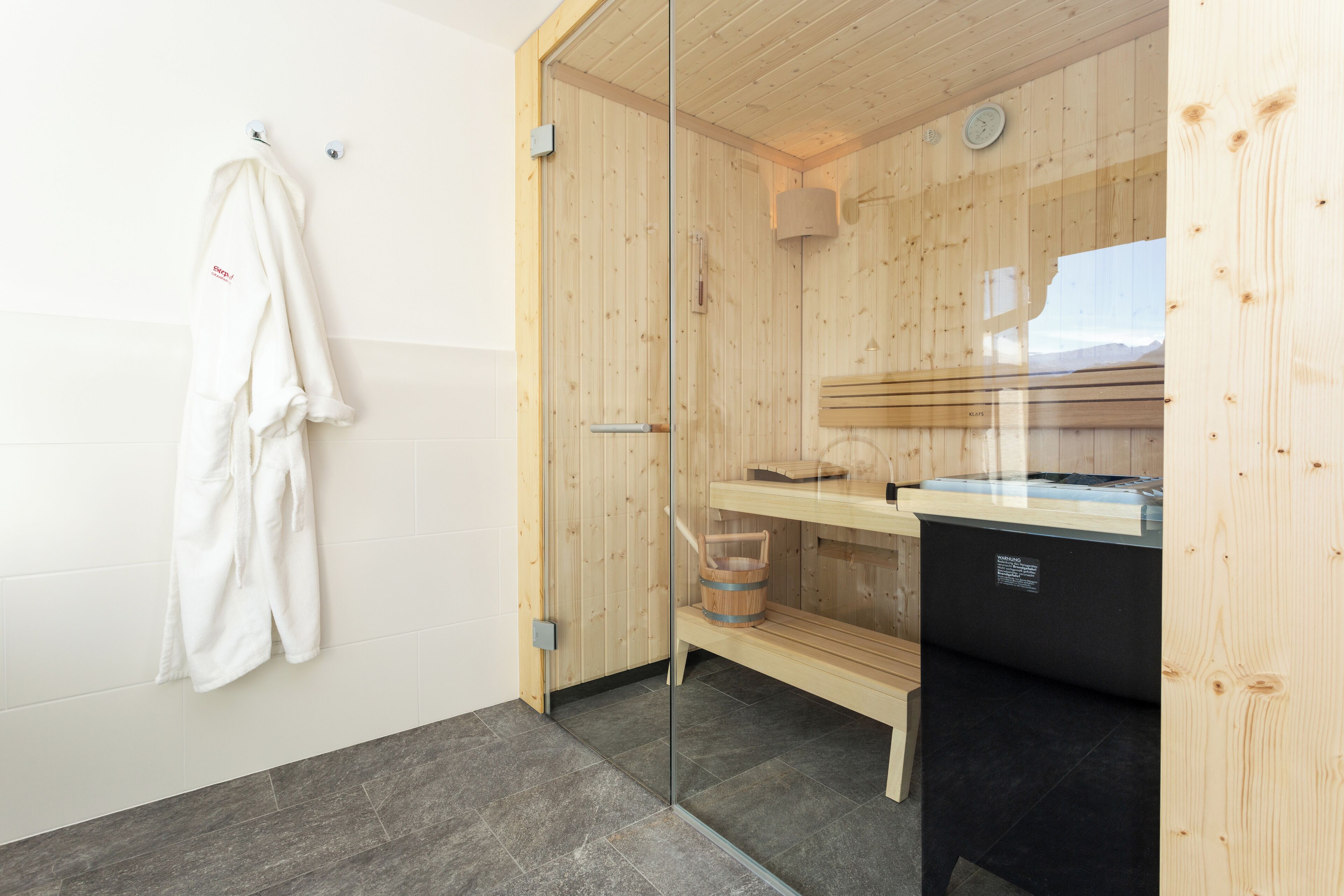 deluxe suite, 1 bedroom, sauna, mountain view | 1 bedroom, hypo-allergenic bedding, minibar, in-room safe