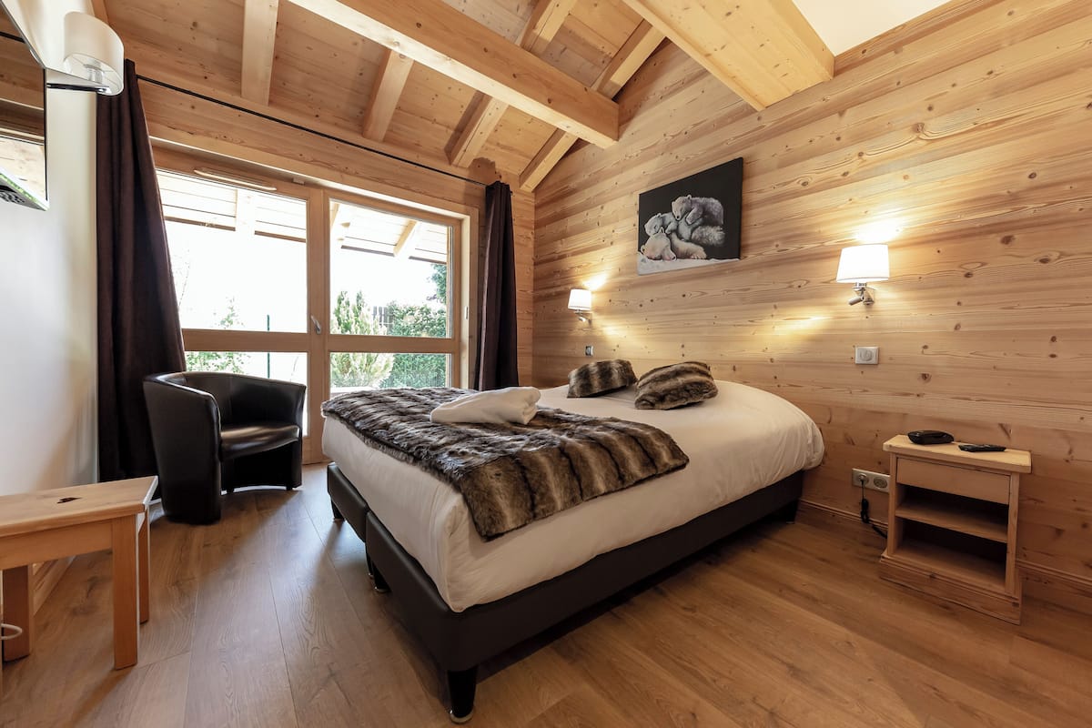 comfort double room | in-room safe, desk, laptop workspace, blackout curtains