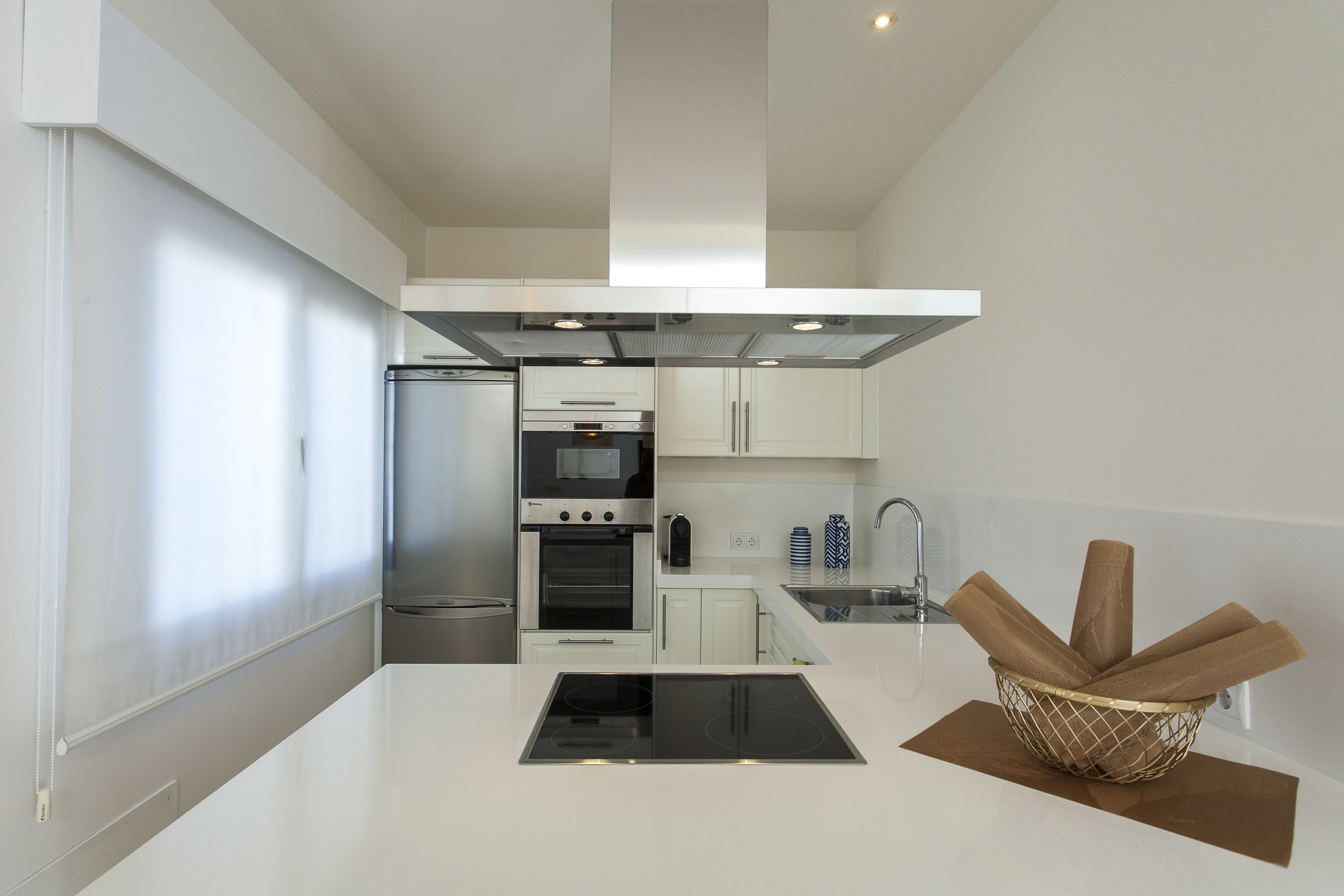 full-sized fridge, microwave, stovetop, dishwasher