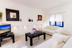 Premier Villa, 1 Bedroom, Pool View | Living room | Smart TV - Bahiazul Resort Fuerteventura (La Oliva)