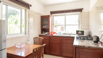 Villa, Sea View | Private kitchen | Fridge, microwave, stovetop, coffee/tea maker