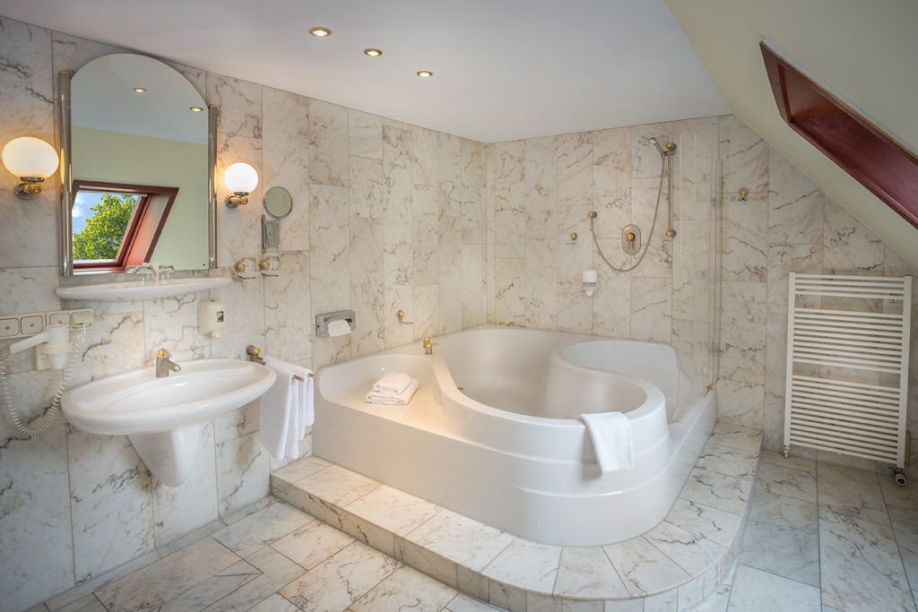 deluxe suite | bathroom | free toiletries, hair dryer, towels, soap