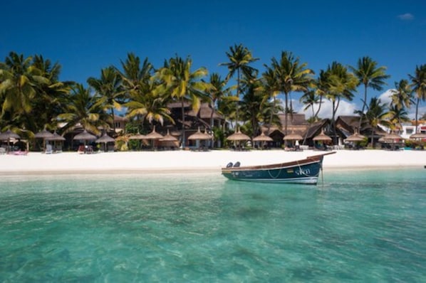 Private beach, white sand, free beach cabanas, sun-loungers
