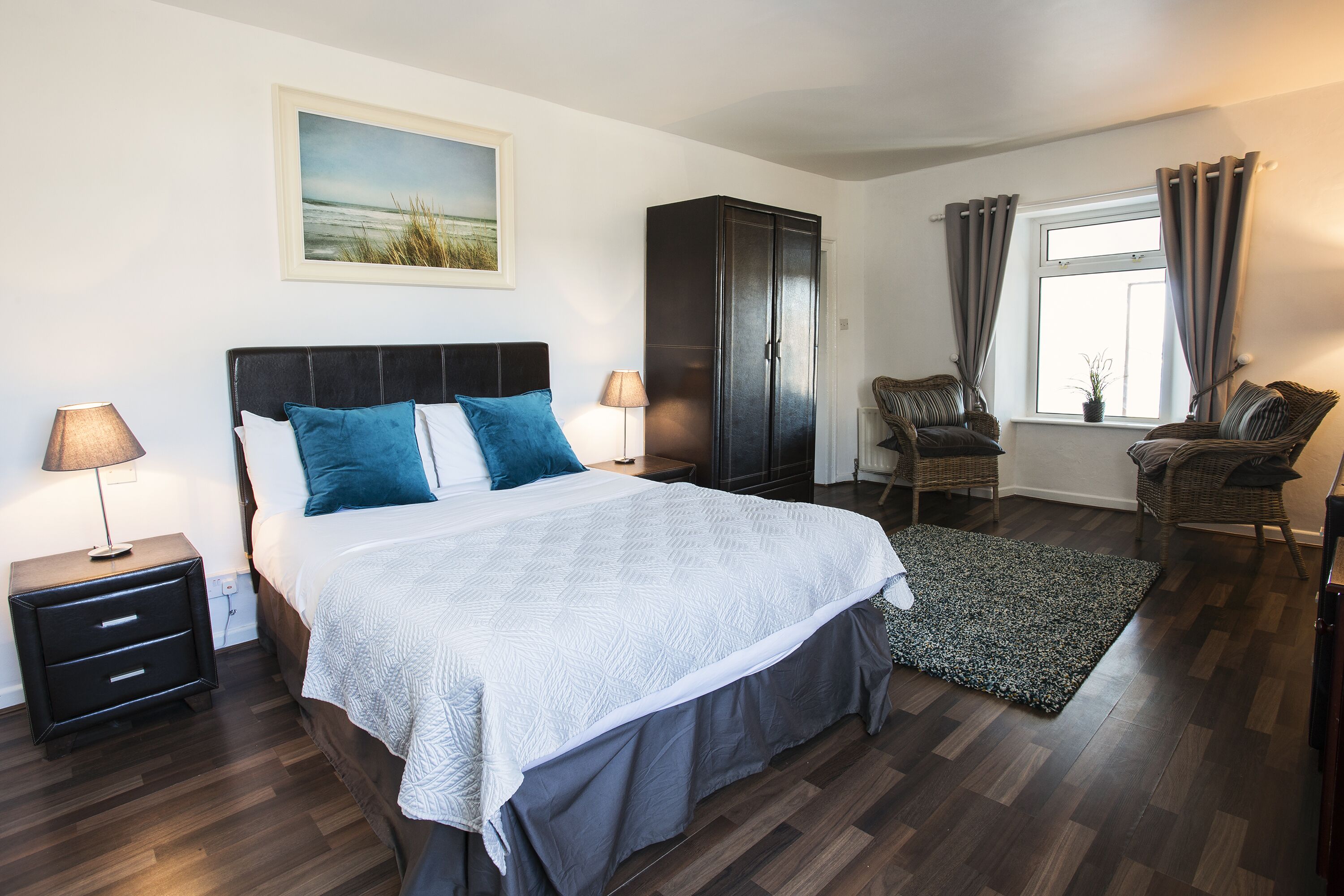 Quarto casal básico, 1 cama de casal, vista para o mar | Escrivaninha, ferros/tábuas de passar roupa, Wi-Fi de cortesia