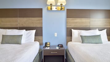 Suite, City View (2 Queens/Sofa, No pets allowed) | 1 bedroom, blackout curtains, iron/ironing board, free WiFi