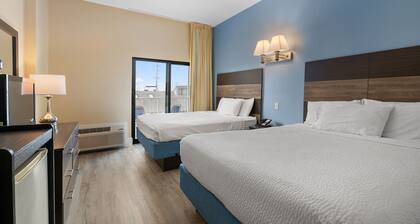 Coastal Palms Inn & Suites