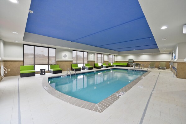 Indoor pool, open 6:00 AM to 11:00 PM, pool loungers
