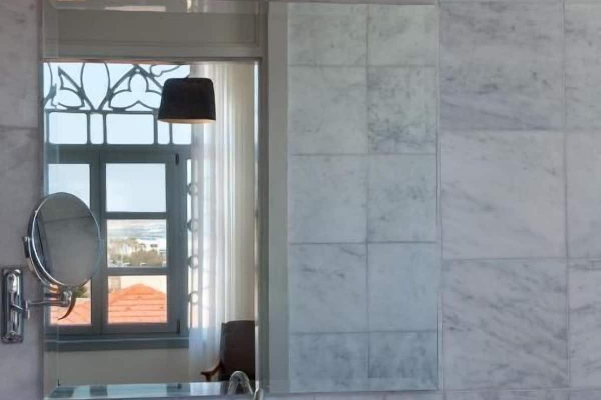 royal room, sea view | bathroom | hair dryer, bathrobes, slippers, towels