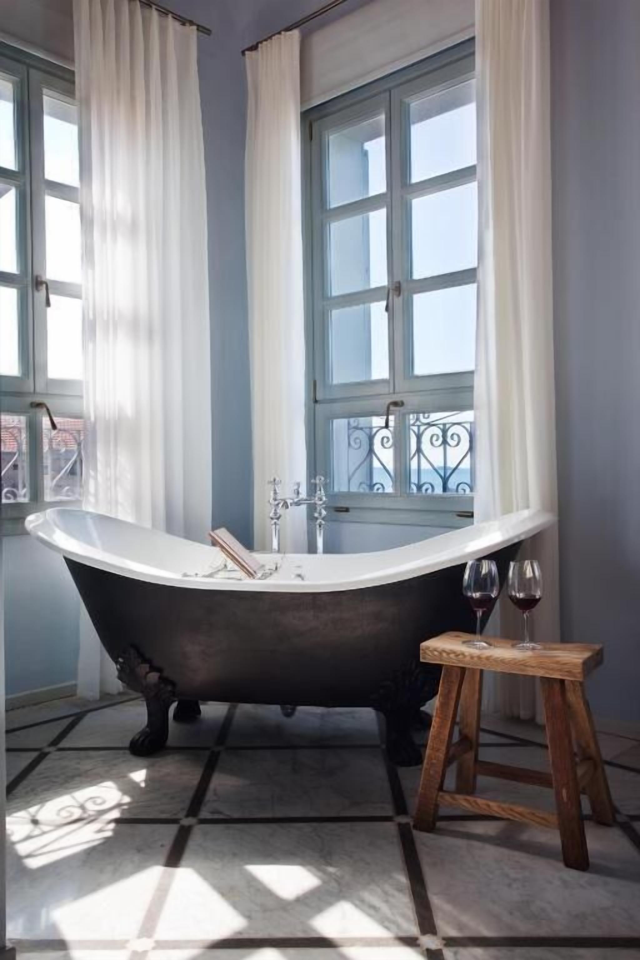 royal suite | bathroom | hair dryer, bathrobes, slippers, towels