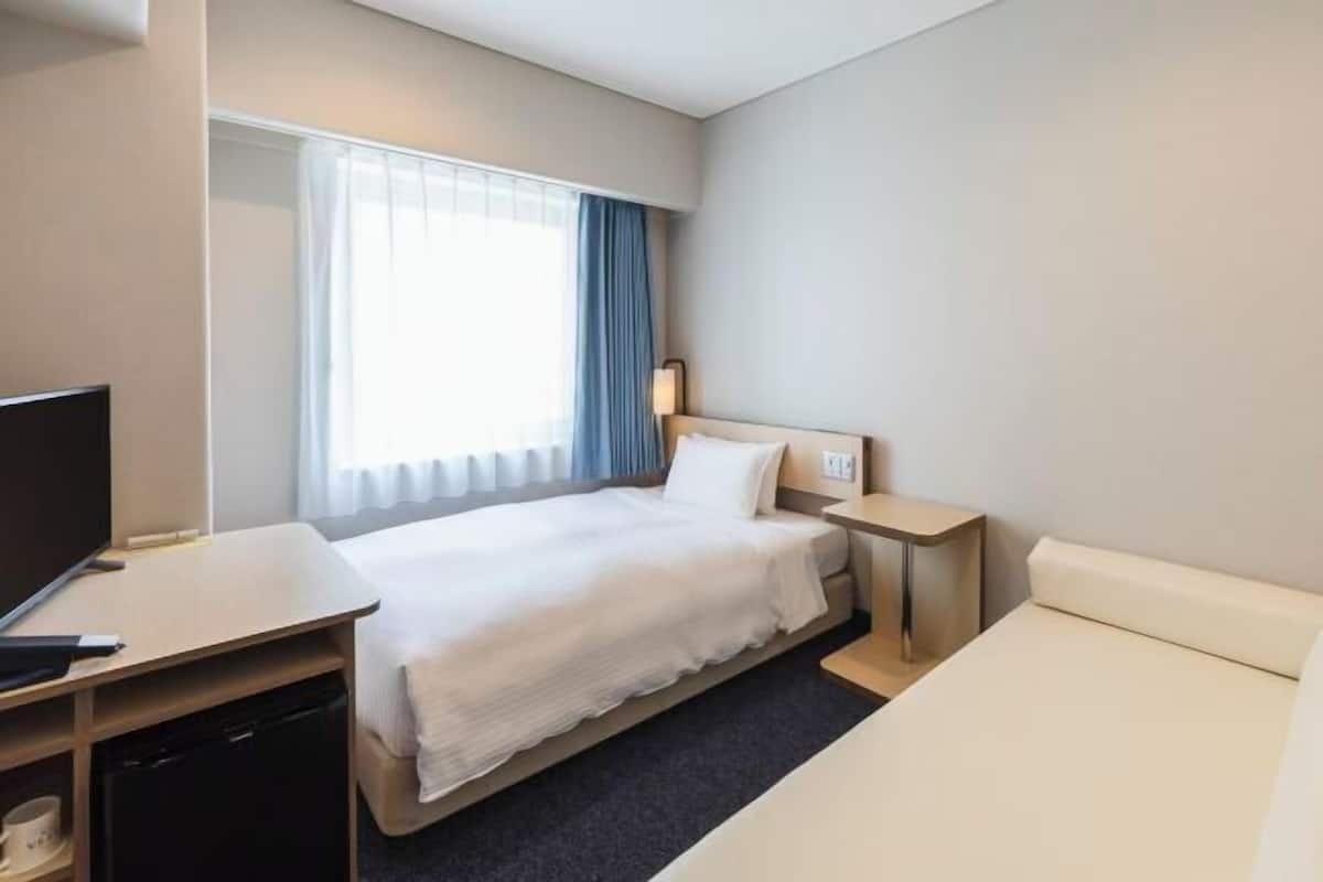 Down duvets, blackout curtains, free WiFi, bed sheets