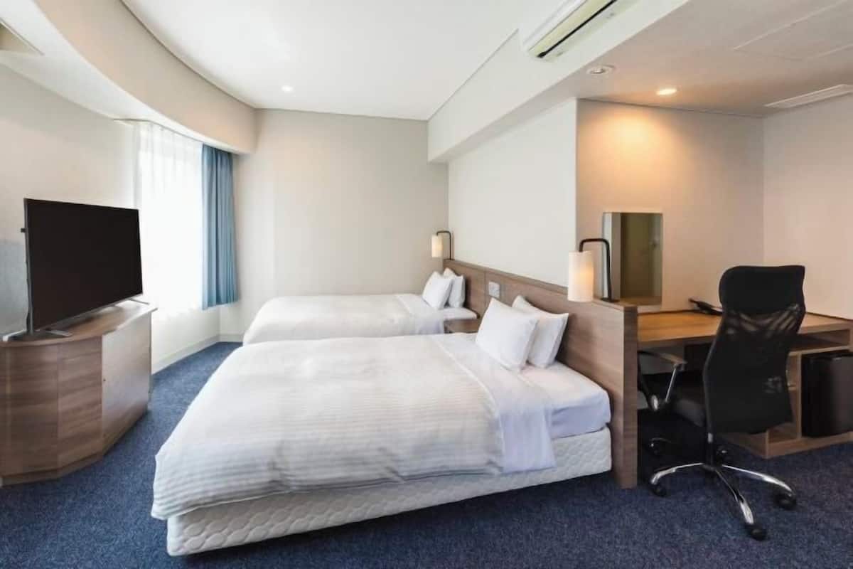 Down duvets, blackout curtains, free WiFi, bed sheets