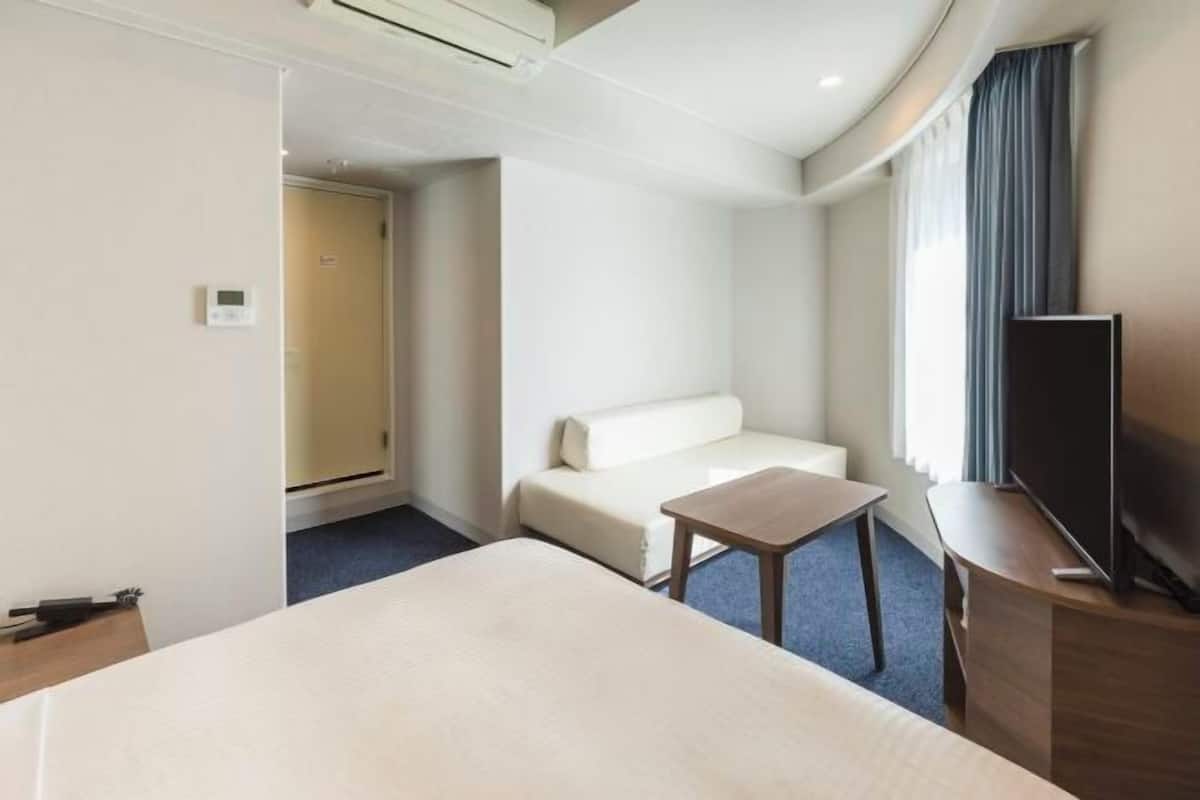 Down duvets, blackout curtains, free WiFi, bed sheets