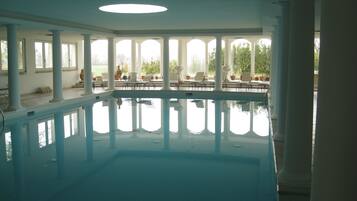 Indoor pool, open 9 AM to 7 PM, sun loungers