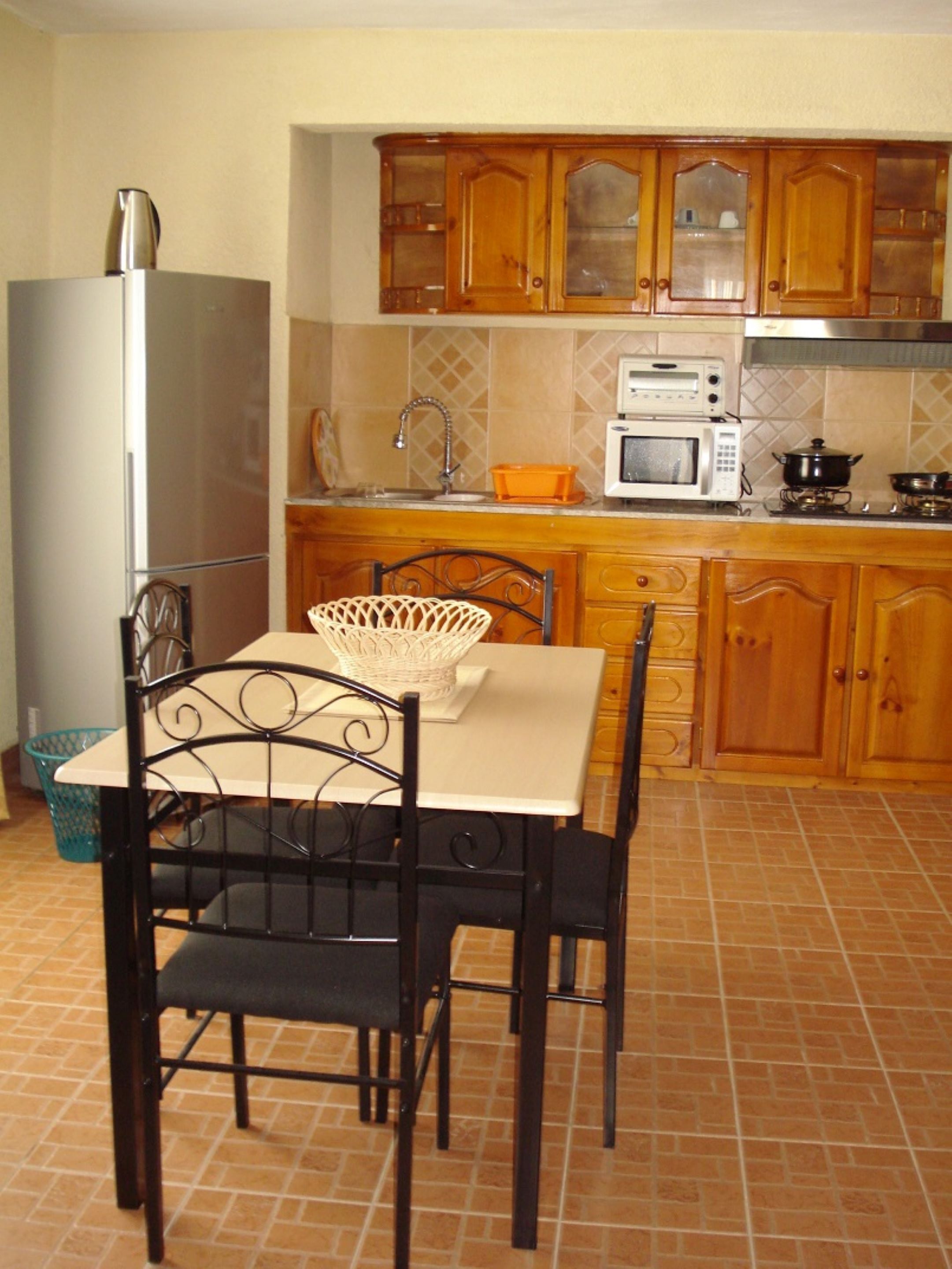 comfort studio suite, multiple beds, kitchen, ocean view | private kitchen | fridge, microwave, electric kettle, toaster