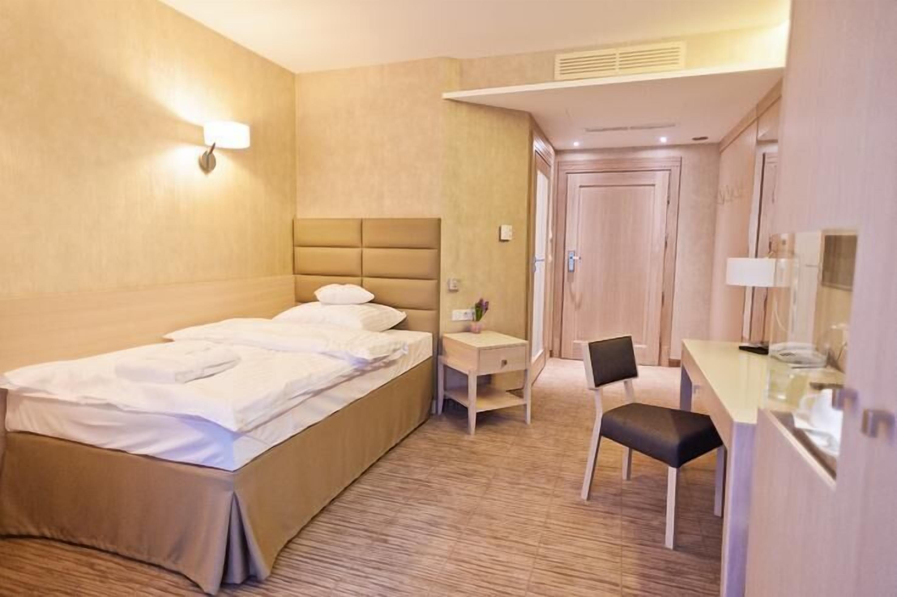 comfort single room | premium bedding, down duvets, minibar, in-room safe