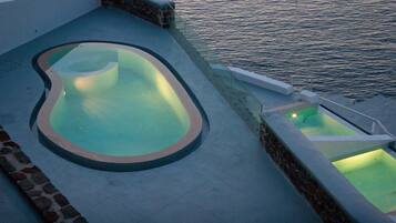 Indoor pool, seasonal outdoor pool, pool umbrellas, sun loungers