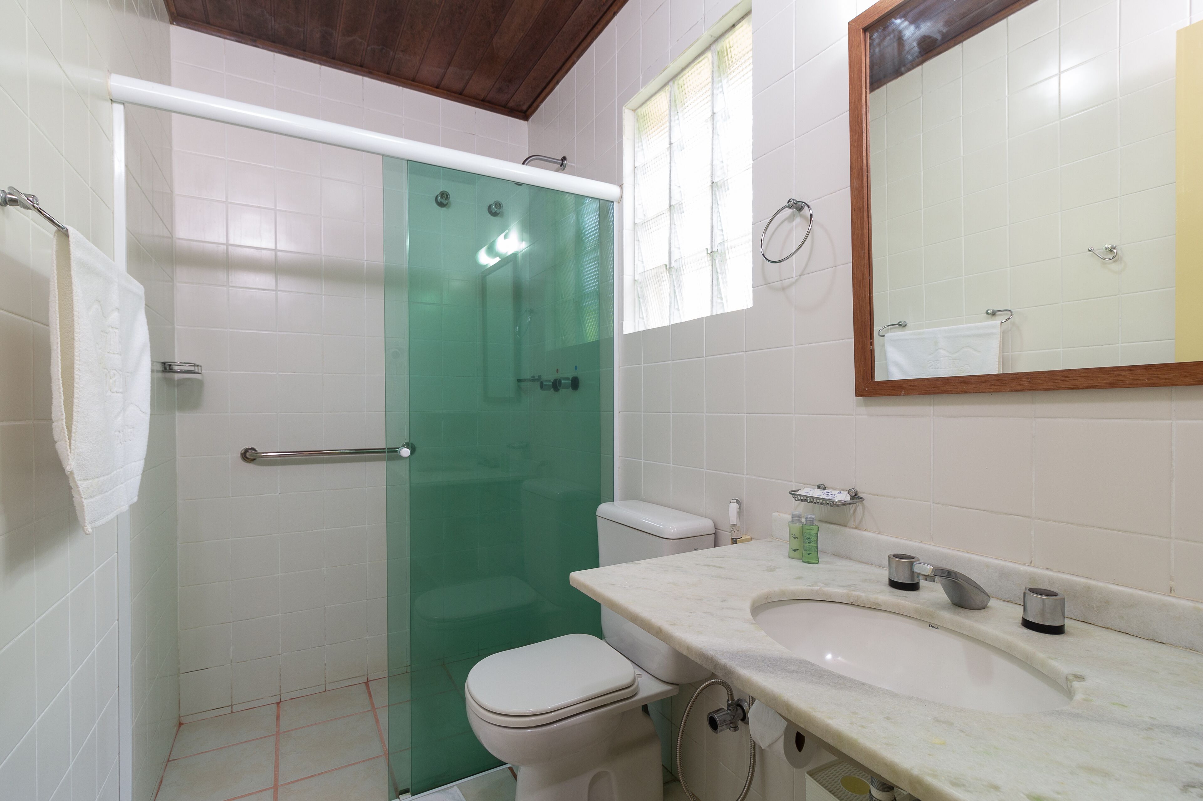 suite | bathroom | shower, hair dryer, towels