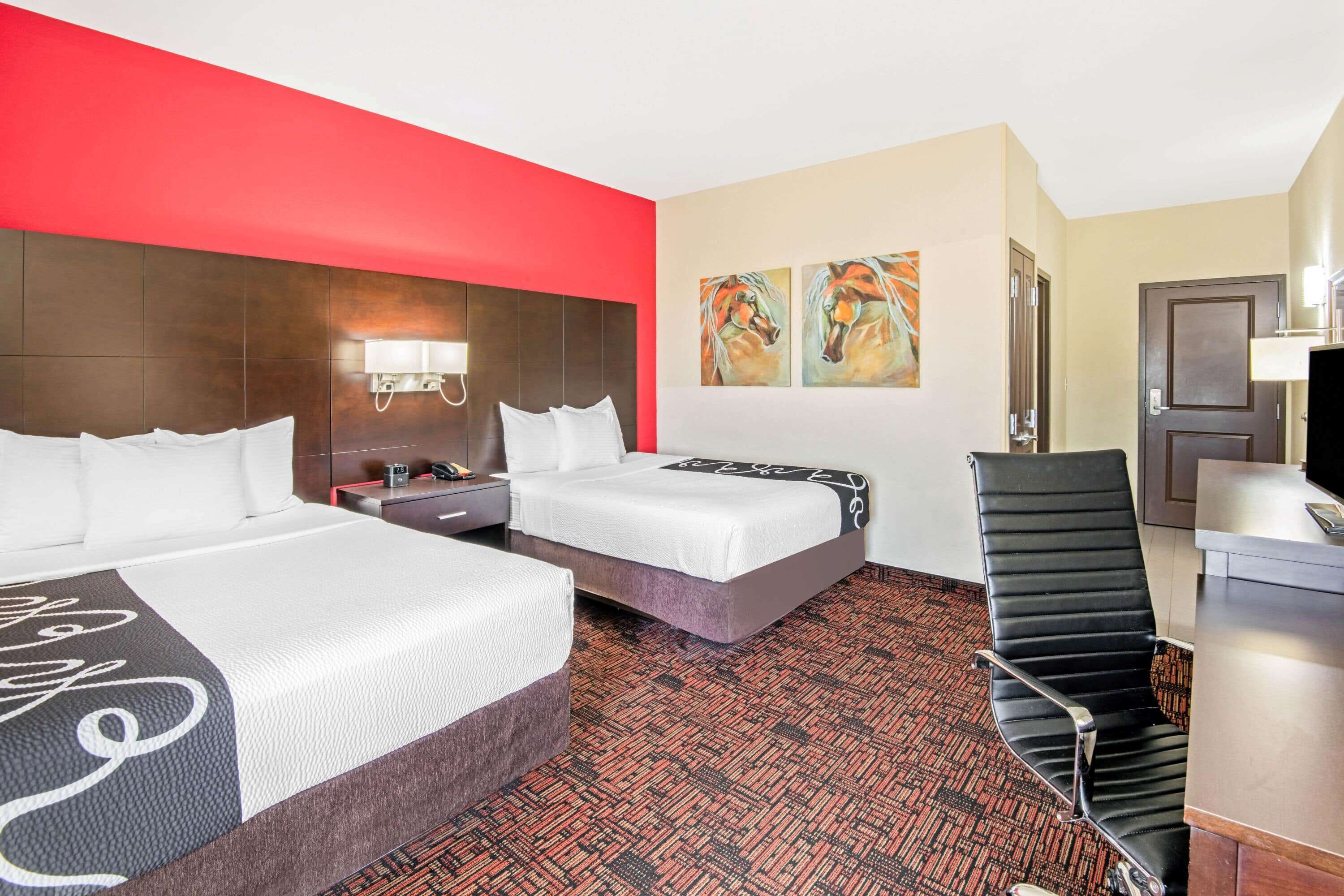 premium bedding, pillow-top beds, desk, laptop workspace