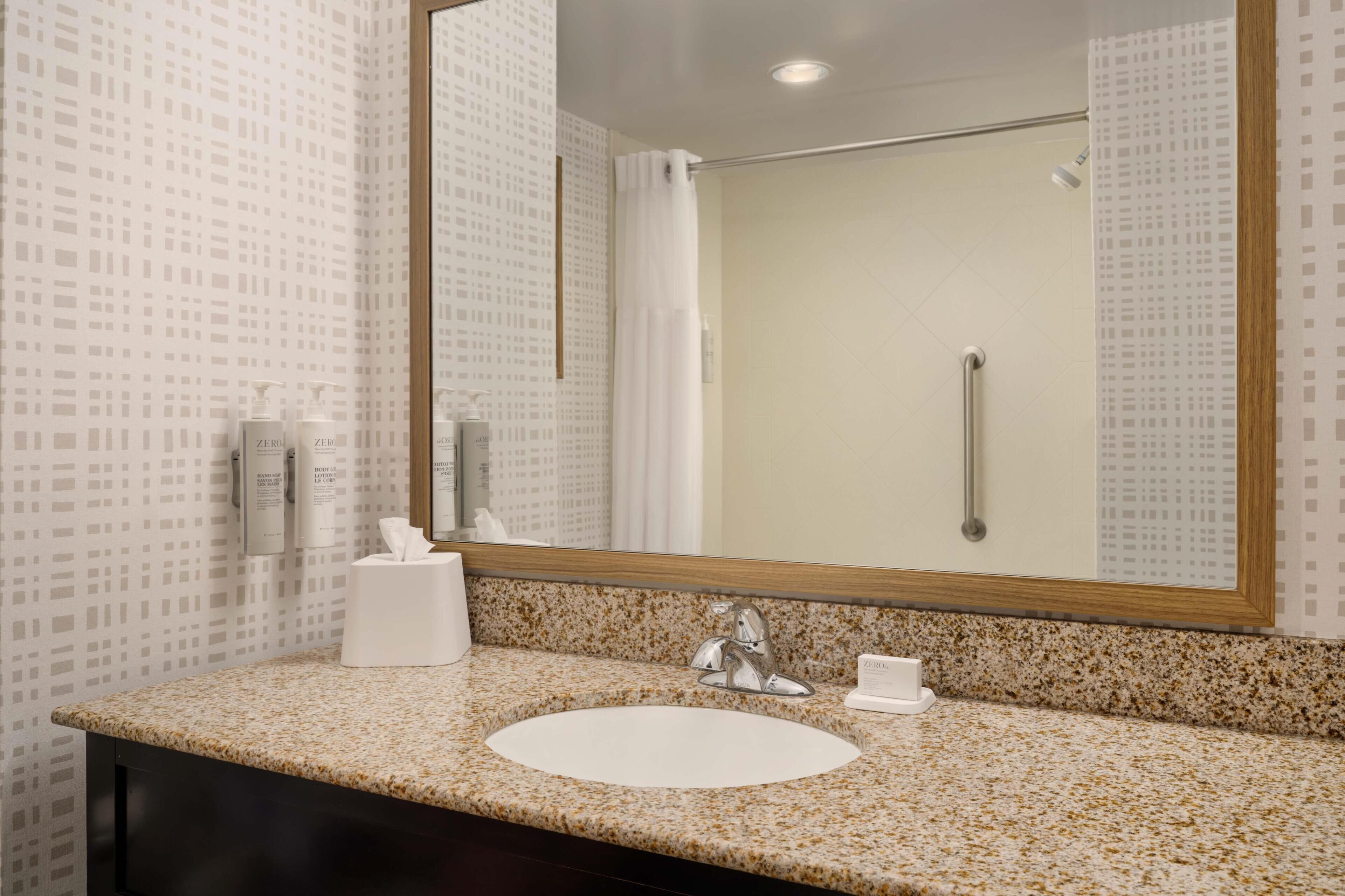 Two Queen Beds | Bathroom | Free toiletries, hair dryer, towels, soap