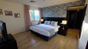 Junior Suite with Balcony (Double Bed) | Down comforters, minibar, in-room safe, individually decorated - St. George Hotel Jerusalem (Jerusalem)