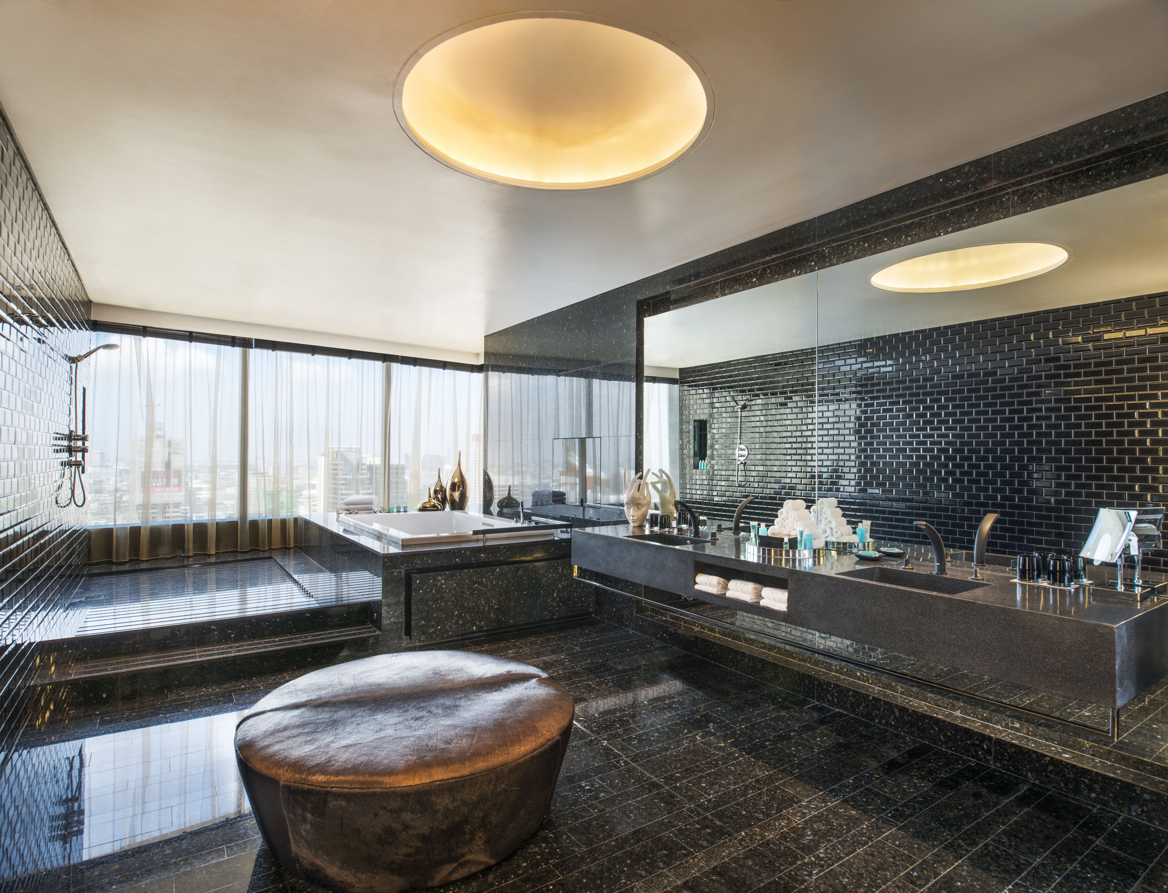 separate bathtub and shower, jetted bath, rainfall showerhead