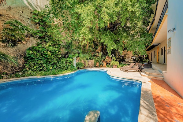 Outdoor pool, pool umbrellas, pool loungers