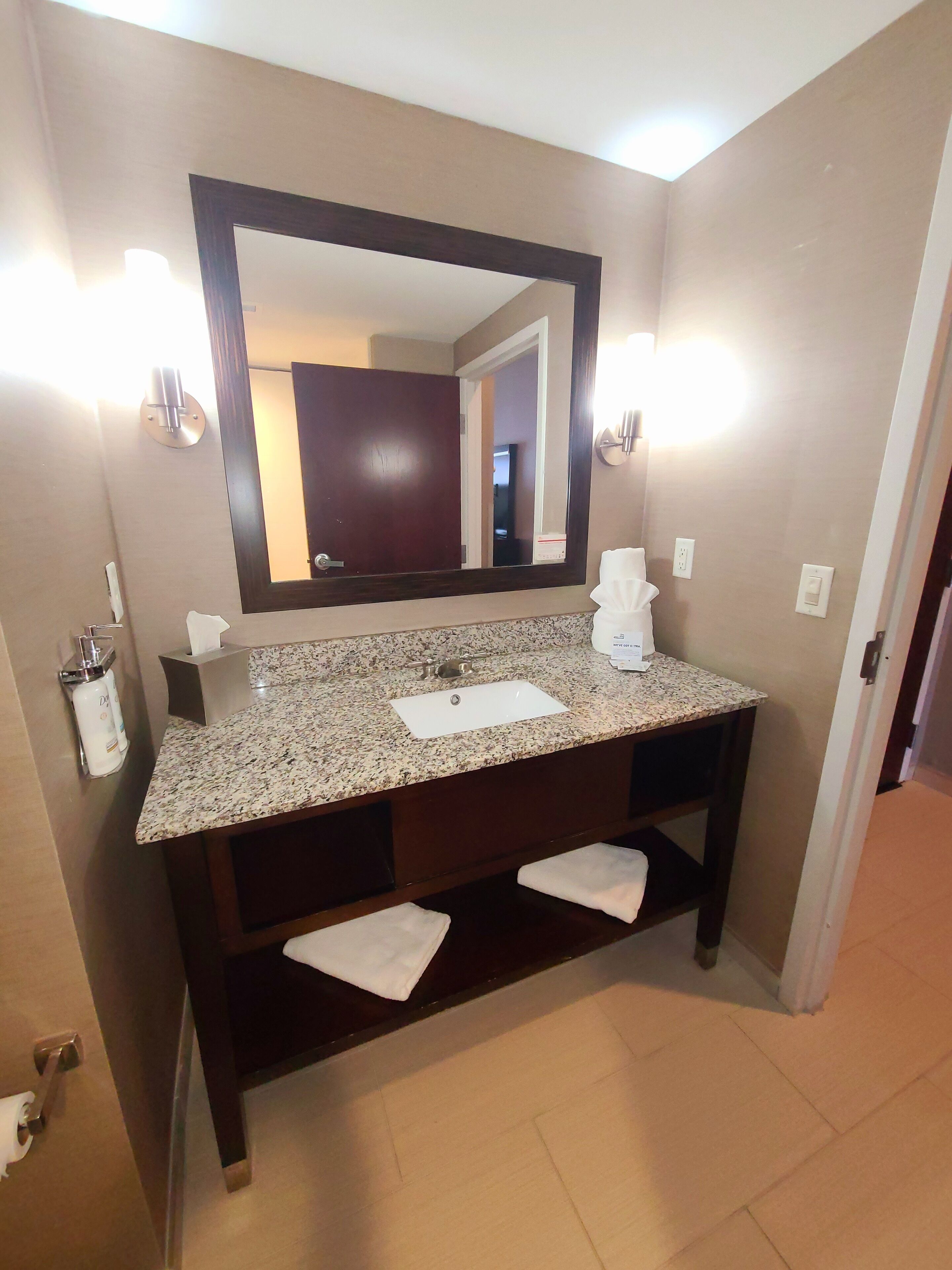 eco-friendly toiletries, hair dryer, towels