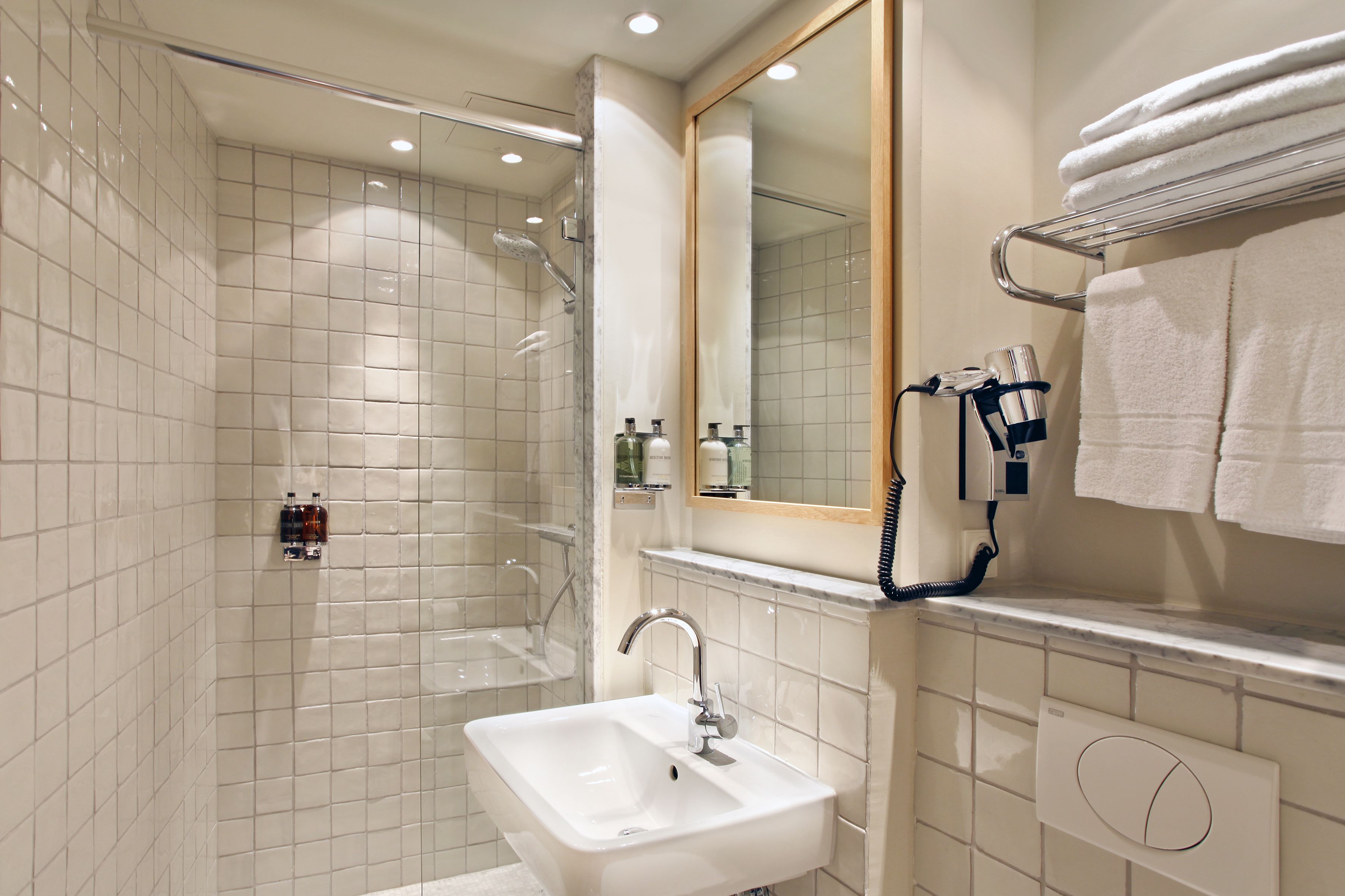 bijou suite | bathroom | shower, rainfall showerhead, designer toiletries, hair dryer