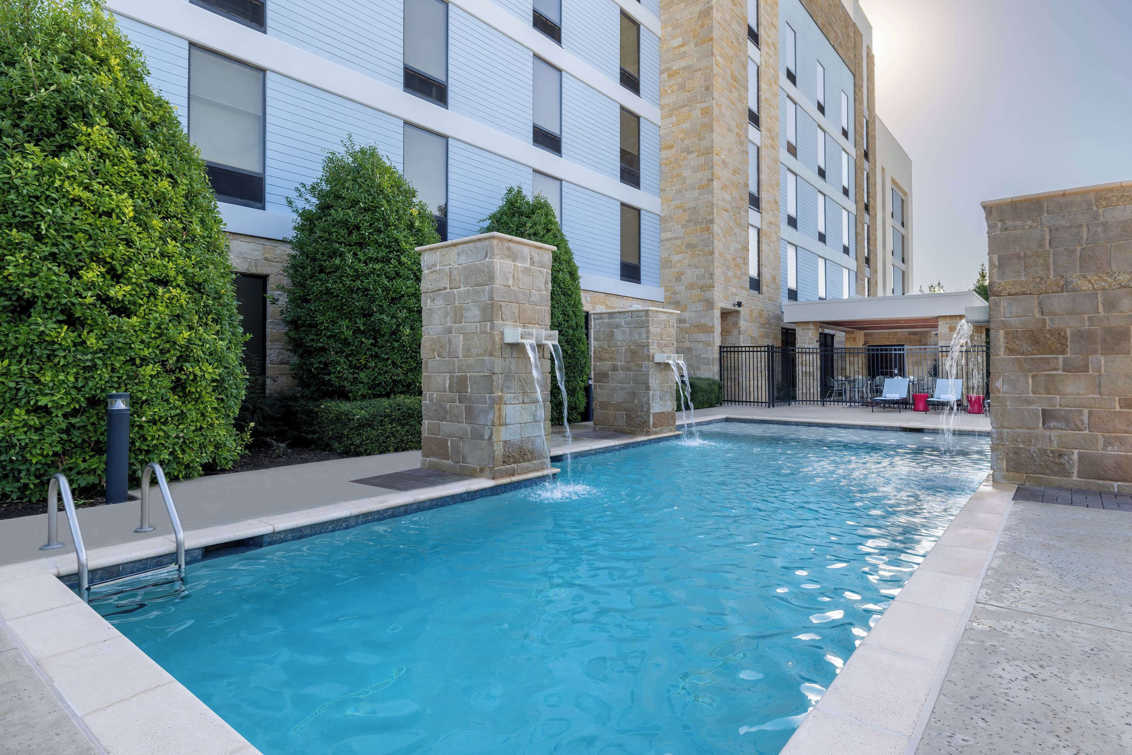 outdoor pool, open 8:00 am to 10:00 pm, pool umbrellas, pool loungers